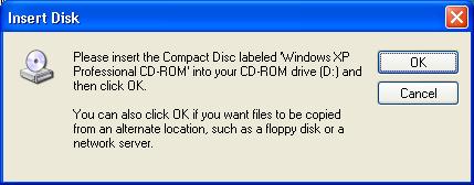 Adım 6 Windows XP kurulum CD'sini optik sürücüye