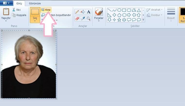 -Paint de açtığınız resminizin etrafını çerçeveleyerek KIRP butonu kırpınız. 3. -Kırptığınız resim boyutlarını ayarlamak için 1 nolu ok ile gösterilen Yeniden Boyutlandır butonuna tıklayınız.