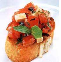 BRUSCHETTA Capri (Italia meridionale) Ingredienti: Fette di pane spesse Pomodori, mozzarella di bufala, olive nere Olio di oliva