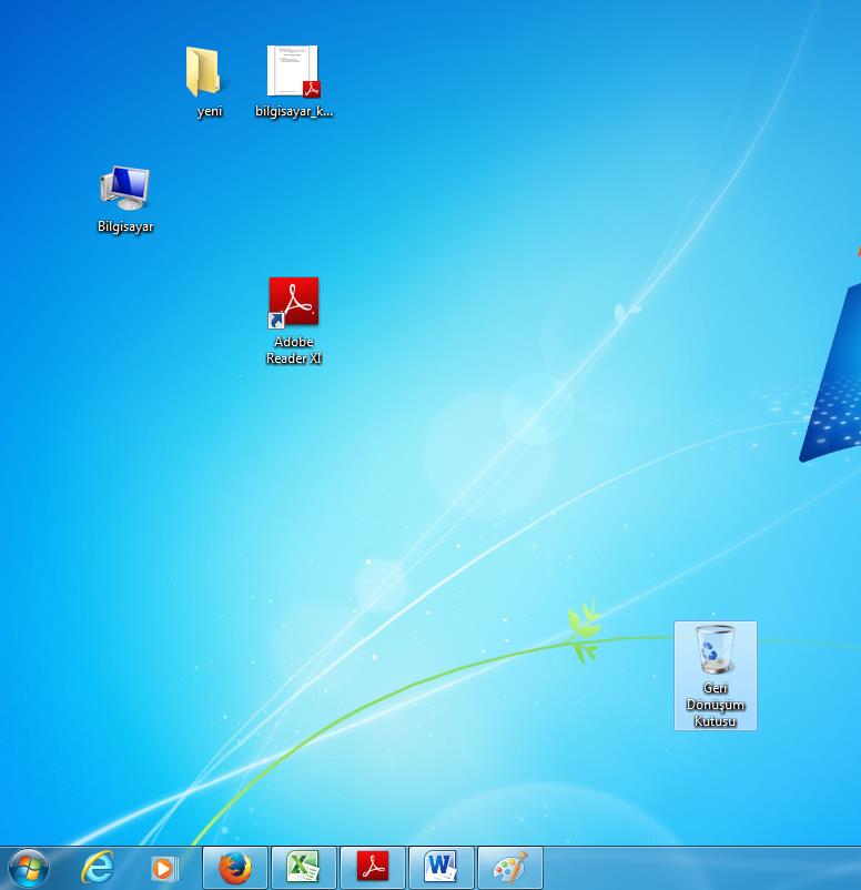 1.1.1. Arayüzü tanıma Bilgisayar Geri Dönüşüm Başlat Menüsü Programlara burdan girilebilir Çalışan Programlar Şekil 2 Bilgisayar masaüstü Yukarıdaki resim Windows 7 işletim sisteminin ekran görüntüsüdür.