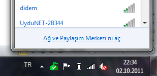 Ağ Ayarlarına erişmek için Görev çubuğunun üzerinde bulunan Bildirim alanındaki simge