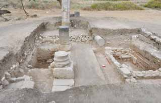 KAZI RAPORLARI EXCAVATION REPORTS main channel. This extends in an east-west direction under the pavement of the street and is covered with rectangular slabs.
