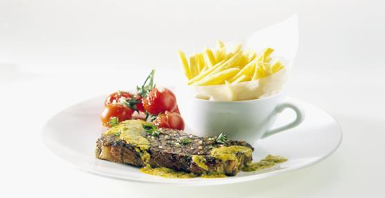 Bonfile Café de Paris Fillet Café de Paris 63 Klasik tarzında sıcak, köpüklü ve baharatlı tereyağı sos özel tabağında patates kızartması ile servis edilir Classically prepared with hot foamy herb