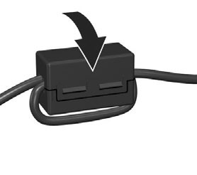 Kablo iki kez ferritten geçecek şekilde (burada gösterildiği gibi), kabloyu ferrite dolayın.