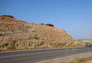 Figure 27: Serravalian-Tortonian Esentepe Formation exposed on the slope of Arapköy eastern ridge (e) and unconformably overlying Quaternary terrace deposits (Q) on the ridge and a hill.