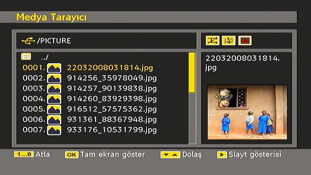 JPG Dosyalarını Görüntüleme Görüntü Oynatma Atla (Rakam tuşları) : Rakam tuşları kullanılarak seçilen dosyaya atlanır. OK : Seçilen dosyayı tam ekranda görüntüler.