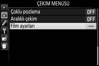 Manuel film ayarları: Fotoğraf makinesi M modundayken, enstantane hızı ve ISO duyarlılığına manuel ayarlamalar yapılmasına izin vermek için Açık seçeneğini seçin.