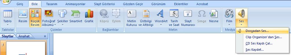 Resim 4.34: Ses ekleme Bilgisayarda kayıtlı bir ses dosyasını slayta eklemek için Dosyadan Ses seçeneği seçilir ve Dosya Aç iletiģim kutusundan istenilen ses dosyası bulunarak sunuya eklenir.