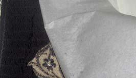 3- Desenin üzerine mulaj kağıdı koyarak sıcak ütü ile buhar vermeden ütüleyerek alt ipliği