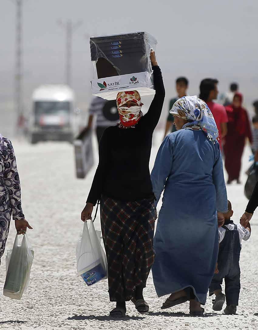 Fotoğraf: Emrah Gürel/ AP Belediyelere mülteciler için kullanılmak üzere mülteci