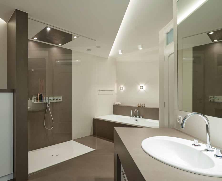 PRIVATE RESIDENCE GERMANY Walls, Floors, Vanity Top, Bath Tub Veneering: Barro & Avorio Satin & 12 mm Designed & Installed by: ROSSKOPF &