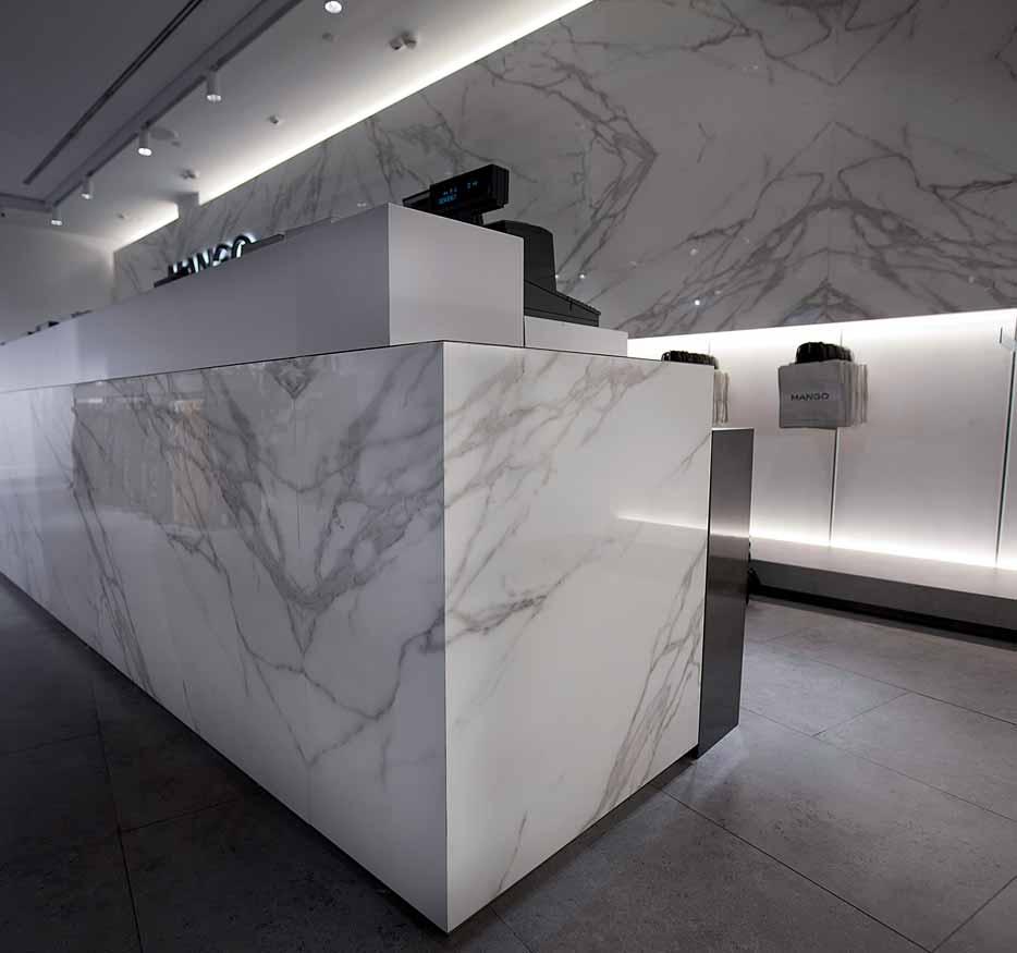 MANGO FLAGSHIP STORE MILANO (ITALY) Wall Cladding & Counters: