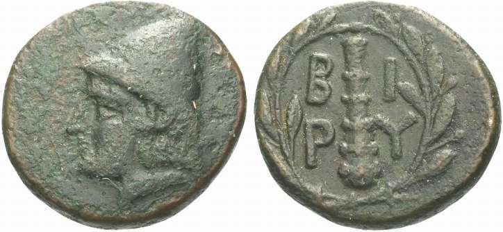 14 Katalog 3 Ö.Y. Sade pilos ile, sol profilden, genç ve sakalsız Kabeiros. A.Y. Defne çelengi içerisinde Herakles in Lobutu ve lejant yer almaktadır.