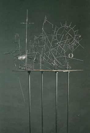 Mühendis olduğu kadar bir sanatçı da olan Ganson, cilasız çelikle, bulduğu nesnelerle, el yapımı dişlilerle ve kabaca lehimlenmiş tellerle çalışıyor.