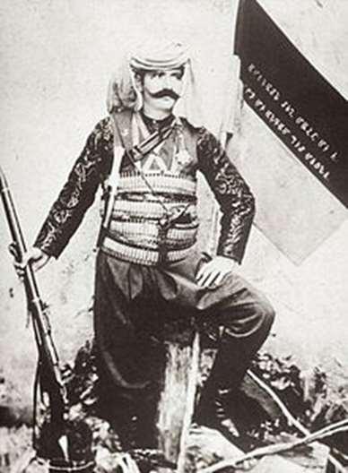 Andranik with a rifle and a flag