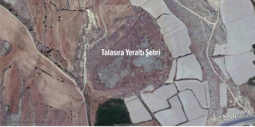Üçüncü Ara Rapor Çalışmaları Talasıra Yeraltı Şehri 19 TALASIRA YERALTI ŞEHRI Gesi ye bağlı Güzelköy ile Kayabaşı köyleri arasında bulunan ovada yer alan 150 metre çapındaki yuvarlak tüf kaya