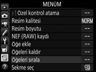 Taşımak istediğiniz öğeyi vurgulayın ve J düğmesine basın. 3 Öğeyi konumlandırın.