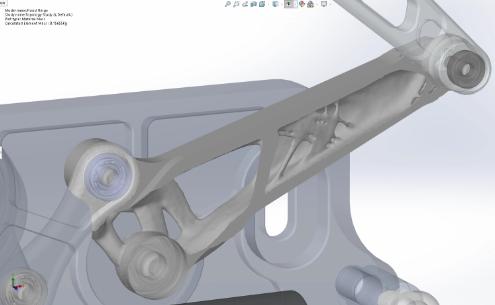 Optimize edilmiş parçanın düzleştirilmiş meshini yeni geometri olarak kaydetmek için Malzeme Kütlesi grafiğine sağ tıklayın ve Düzleştirilmiş Mesh Ver seçeneğini belirleyin.