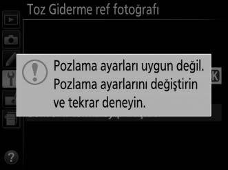 3 Görüntüden Toz Giderme özelliği referans verilerini elde edin. Görüntüden toz giderme özelliği referans verilerini elde etmek için deklanşöre sonuna kadar basın.