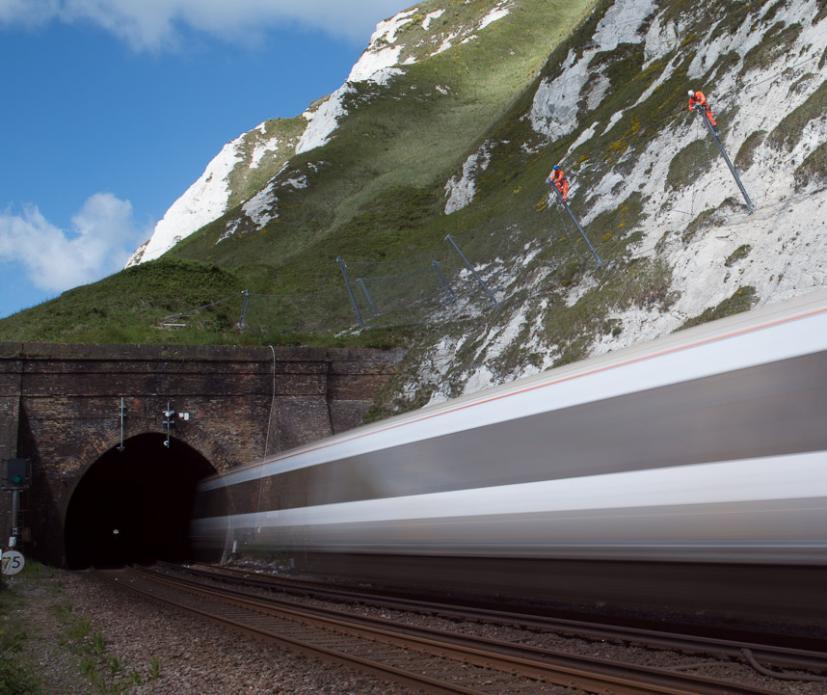 Train passing under one of the GBE-1000A (for 1000 kj) rockfall