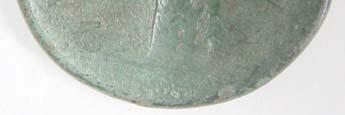 149 Env. No : 1779/1 Malzemesi : Bronz Çap : 3,41 cm Ağr. : 22,8 gr Çağı : Roma (Hadrianus Dönemi) Ön yüz : Sikke korozyona uğradığı yazılar okunmamaktadır.