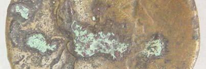 46 Env. No : 1403 Malzemesi : Bronz Çap : 3,35 cm Ağr. : 23,2 gr Çağı : Roma (Traianus Dönemi) Ön yüz : Sikke korozyona uğradığı için yazılar tam olarak okunmamaktadır.