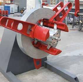 box and belt-pulley mechanism Friction or pneumatic brake options Mandrel expansion: Mechanical by manual Motor speed is controlled by frequency inverter to obtain acceleration and