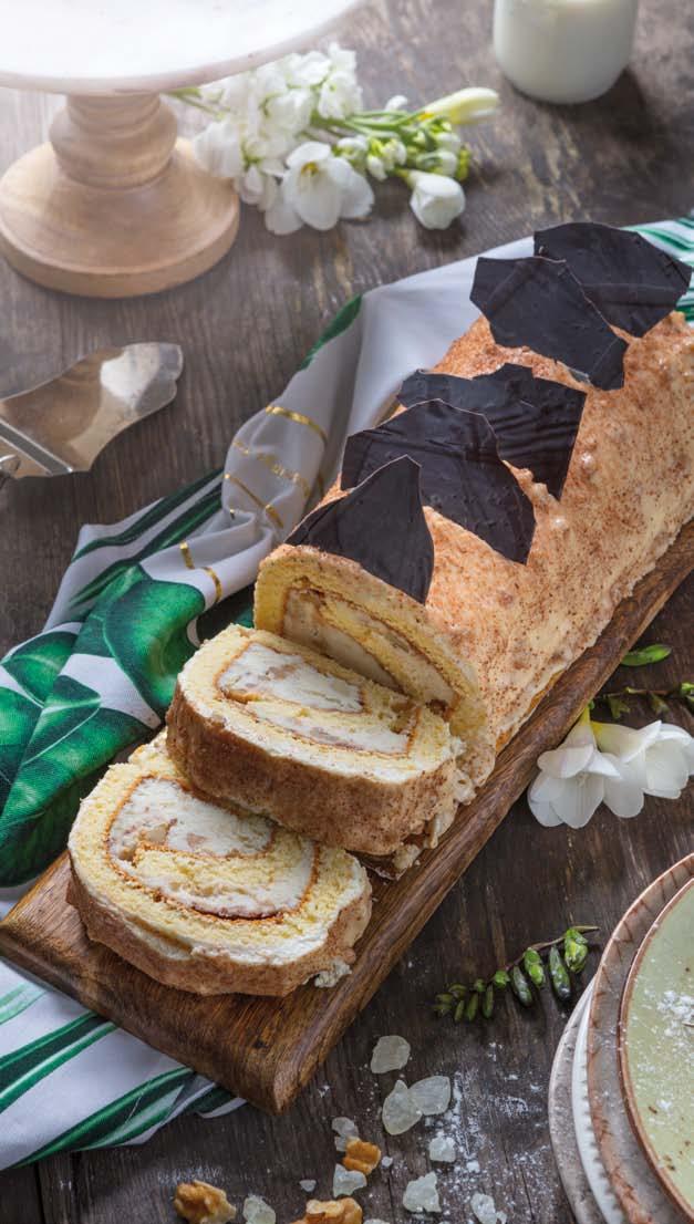 Adaların Serinliği SAKIZLI MARKİZ Sade rulo kek arasında doğal damla sakızı ve pişirilmiş özel Özsüt Kreması ve ceviz parçaları.