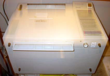 Şekil 6: Otomatik film banyo makinesi Panoramik film kasetine yerleştirilmek üzere hazırlanan her basamağı 1 mm