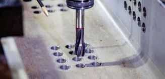 For instance; if the holes diameters are 10 mm and the distances between each holes are 40 mm, the spindle is able to drill 12