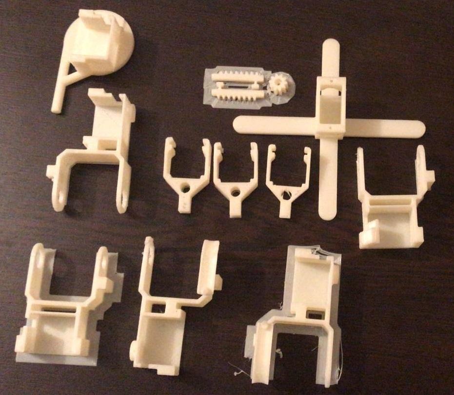 Şekil 1.11: Robot kolu mekanik aksam tasarımı 5 eksenli robot kolun mekanik aksamı Solidworks programında çizilerek ayrı ayrı parçalar halinde üç boyutlu yazıcı ile üretilmiştir.