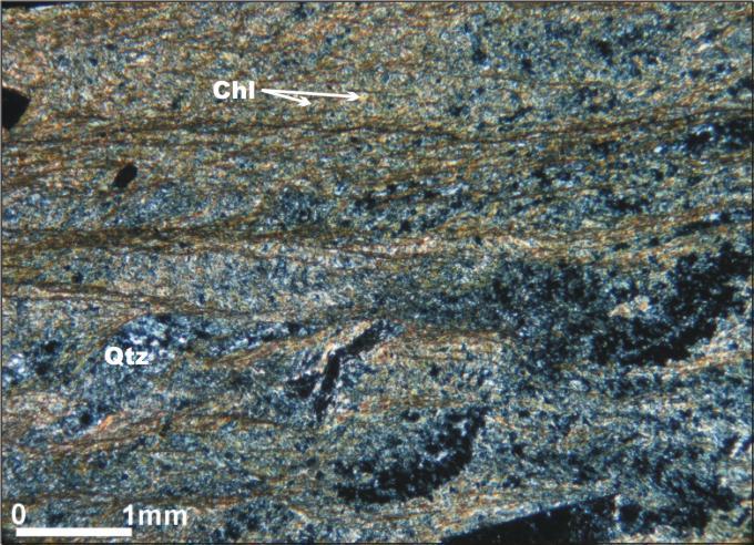 710J1) Cld: kloritoyid, Chl:klorit, Qtz: kuvars Birim, bu özellikleri ile bloklu bir metafliş niteliği taşımaktadır.