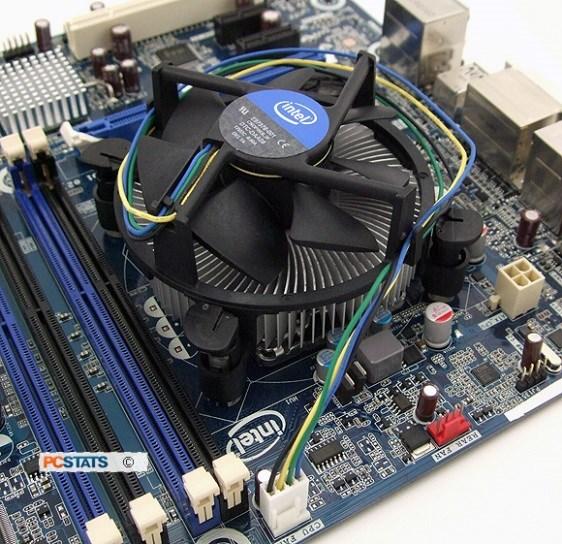 The CPU fits into the motherboard's CPU socket, which is covered by the heat sink, an object that absorbs heat from the CPU.