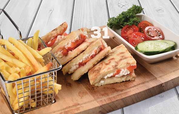 Beyaz Peynirli Bazlama Tost 27 Kaşar Peynirli Kare Tost Kare tost ekmeği içerisinde kaşar peyniri, yanında patates kızartması ve domates, salatalık söğüş ile servis edilir.