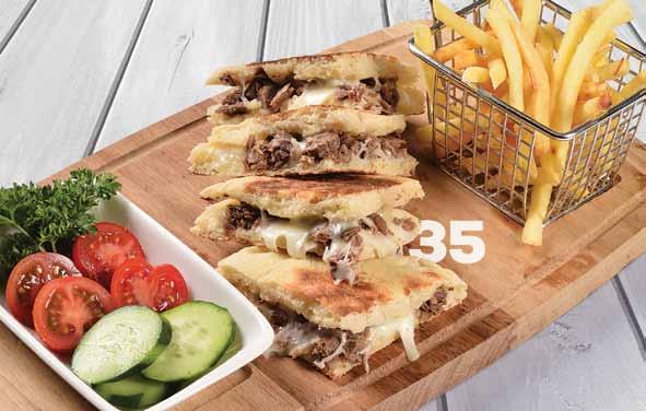 16,50 tl 29 Kaşar Peynirli Sucuklu Kare Tost Kare tost ekmeği içerisinde kaşar peyniri, sucuk, yanında patates kızartması ve domates, salatalık söğüş ile servis edilir.