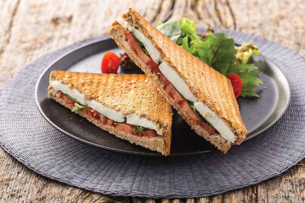 Tostlar KAŞARLI TOST Beyaz tost ekmeği, kaşar peyniri, Akdeniz yeşilliği ve kiraz domates ile KAŞARLI SUCUKLU TOST Beyaz tost ekmeği, kaşar peyniri, sucuk, Akdeniz yeşilliği ve domates ile