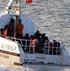 Sabah saatlerinde yasa dışı yollardan Yunanistan Kos adasına geçmeye çalışan 52 kişinin bulunduğu bot Karaada nın Kuzey Feneri açıklarında battı.