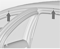 Eşya saklama ve bagaj bölümleri 61 Üçgen ikaz reflektörü Üçgen ikaz reflektörünü bagaj bölümünün sağ tarafında tutucu bandın arkasındaki boşlukta muhafaza edin.