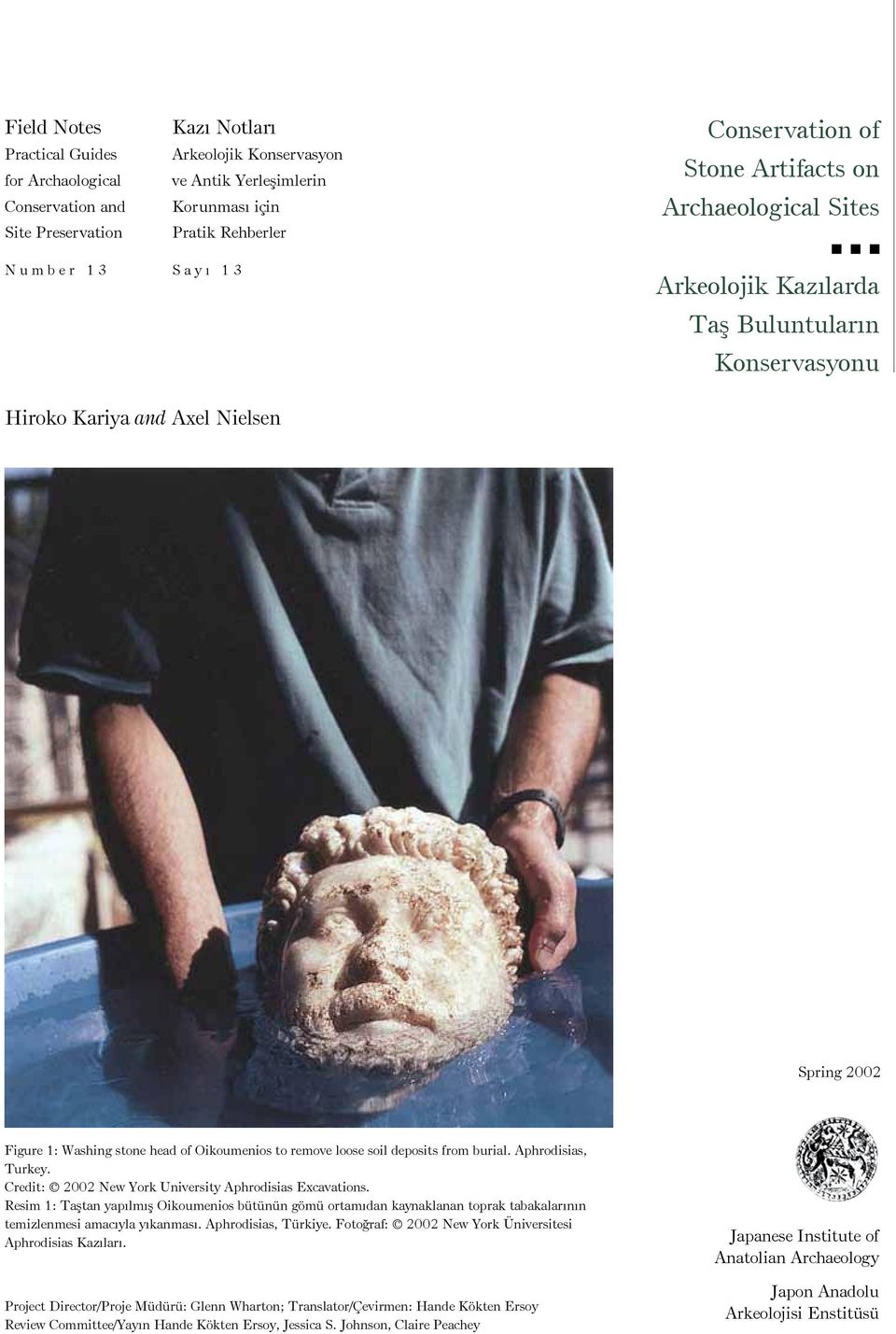 remove loose soil deposits from burial. Aphrodisias, Turkey. Credit: 2002 New York University Aphrodisias Excavations.