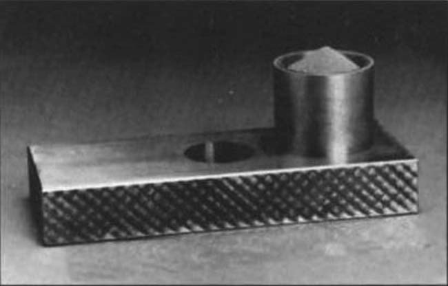 Paketlenme ve sürtünme Yığılma açısı Görünür yoğunluk ölçümü için Arnold Bu yöntemle toz akışını en aza indiren 20 cm3 lük silindirik bir hacme doldurulan