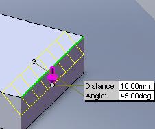 2-)Pah kırılacak yüzey seçilir. 3-)Distance 40 ve Angle 45 verilmiştir. 1-2-1-)Filp Direction: Pah kırma yönünü değiştirmek için kullanılır. 1-2-2-)D1 Distance: Pah mesafesinin belirlendiği alandır.