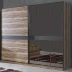 -Geniş ve kullanışlı iç hacme sahiptir -It is two sliding door wardrobe -On the front parts there are walnut and Brown parts between the lacquered painted parts.