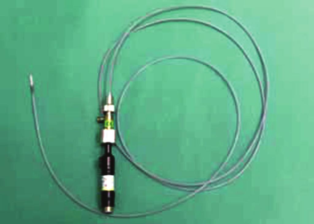 Şentürk A. 57 Resim 1. Radial prob. Resim 2. Radial probla pulmoner nodülün ultrasonografik görüntüsü. mm olduğu için, dış çapı 4 mm ve çalışma kanalı 2.0 mm olan bronkoskopla uyumludur.