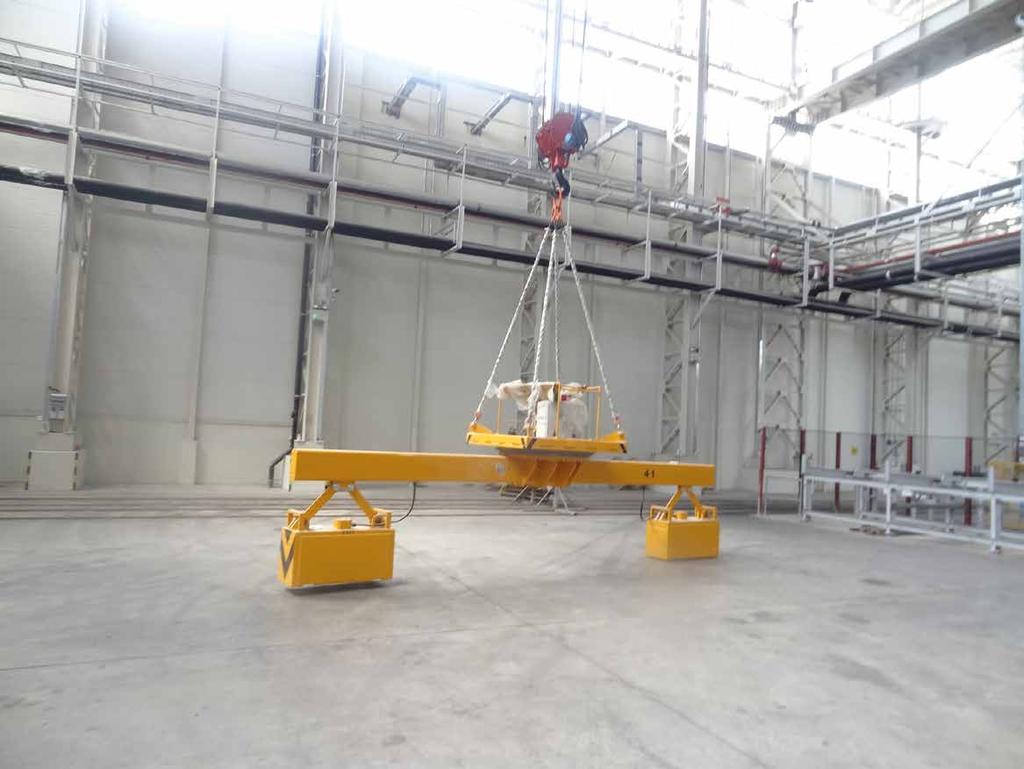 This attachment is used for safety lifting transporting industrial metal, profile, pipe, that works electromagnetic cell specially by holding.