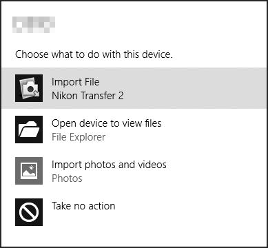 1 Import pictures and videos (Resim ve videoları içe aktar) altında Change program (Programı değiştir) öğesine tıklayın.
