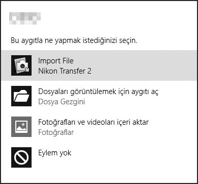 A Windows 7 Aşağıdaki iletişim görüntülendiğinde, Nikon Transfer 2 yi aşağıda açıklandığı şekilde seçin. 1 Resimleri ve videoları alın altında Programı değiştir öğesini tıklayın.