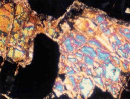 4x10) Figure 4. Catalastic texture in a chromite mineral (XN, 4x10) Sekil 4.