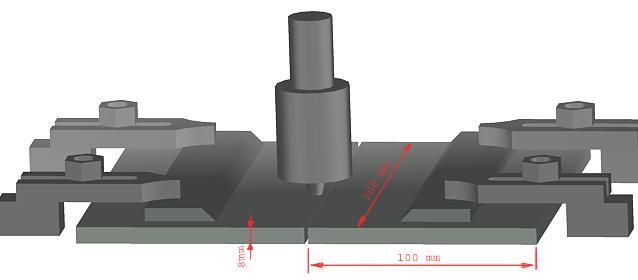 açılmıştır. 10 mm kalınlıktaki altlık malzeme yüzeyi düzlem taşlama tezgâhında taşlanarak, freze tablası üzerine yerleştirilmiştir.