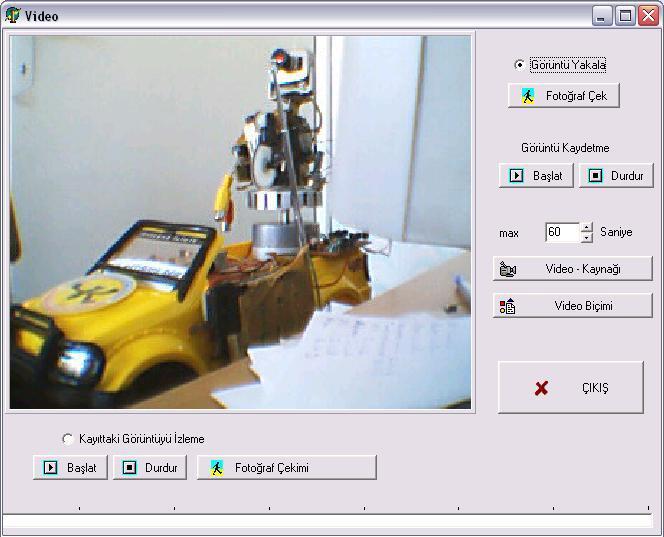 14 Çayıroğlu ve ġimģir (2008), RF sinyalleri ile uzaktan kumanda edilen bir robot araba üzerine yine kontrolü ve görüntü alımı uzaktan olan bir kamera bağlanarak kontrol iģlemi gerçekleģtirmiģtir.