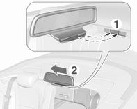 Aracın sol tarafına doğru yanlara kaydırarak arka koltuk başlıkları arasındaki kılavuzdan kapağı çıkarın.